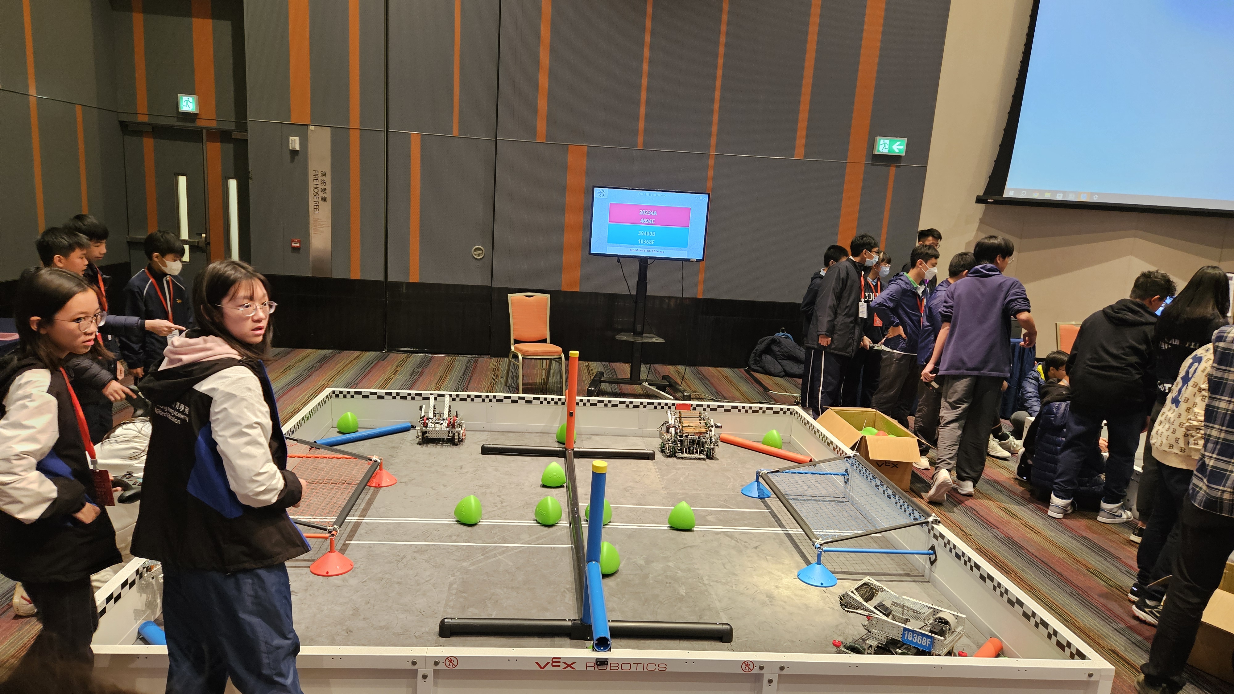 Team operating robot overhead view